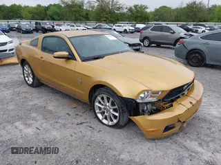 2010 Ford Mustang V6 with VIN 1ZVBP8AN6A5105768, listed as a IAAI auction lot 41964355 with 180,654 mi miles. Bid and sale history available at carsss.com. Image 1.