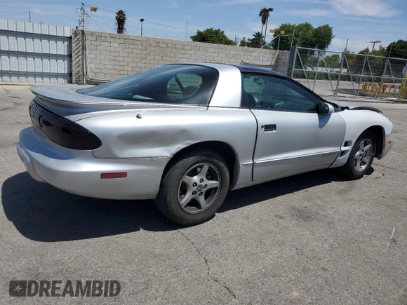 2000 Pontiac Firebird Firebird z VIN 2G2FS22K5Y2116047, wystawiony jako Copart lot #58234695 z przebiegiem 155 876 mil mil oraz Czysty tytuł • Clean title. Historia ofert i sprzedaży dostępna na DreamBid. Obrazek 3.