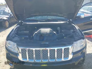 2013 Jeep Grand Cherokee Overland with VIN 1C4RJFCT1DC654653, listed as a IAAI auction lot 41826619 with 124,283 mi miles. Bid and sale history available at carsss.com. Image 10.