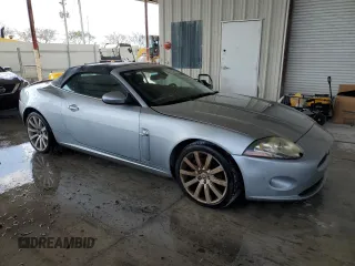 2009 Jaguar XK with VIN SAJWA44B595B31777, listed as a Copart auction lot 52026515 with Not Provided miles and Clean Title. Bid and sale history available at DreamBid. Image 4.
