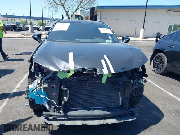 2021 Lexus UX 250h z VIN JTHP9JBH2M2048461, wystawiony jako IAAI lot #42017871 z przebiegiem 56 537 mil mil oraz . Historia ofert i sprzedaży dostępna na DreamBid. Obrazek 13.
