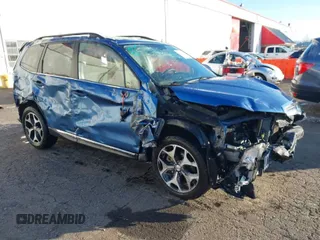 2015 Subaru Forester 2.0XT Touring with VIN JF2SJGUC6FH423454, listed as a IAAI auction lot 41391989 with 126,377 mi miles. Bid and sale history available at carsss.com. Image 1.