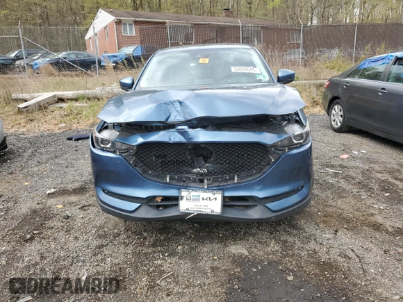 2017 Mazda CX-5 Touring with VIN JM3KFBCL3H0163513, listed as a Copart auction lot 53090045 with 151,675 mi miles and Clean Title. Bid and sale history available at carsss.com. Image 5.