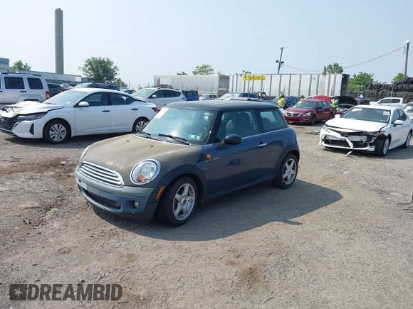 2010 MINI Hardtop with VIN WMWMF3C55ATZ64213, listed as a IAAI auction lot 42432622 with 124,913 mi miles and . Bid and sale history available at DreamBid. Image 2.