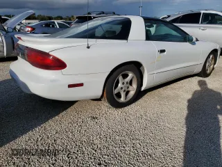 1997 Pontiac Firebird Firebird z VIN 2G2FS22K5V2232134, wystawiony jako Copart lot #74087964 z przebiegiem Nie podano mil oraz Szkody całkowita. Historia ofert i sprzedaży dostępna na DreamBid. Obrazek 3.
