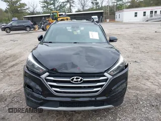 2017 Hyundai Tucson Value z VIN KM8J33A29HU369601, wystawiony jako IAAI lot #41947376 z przebiegiem 140 000 mil mil oraz . Historia ofert i sprzedaży dostępna na DreamBid. Obrazek 13.