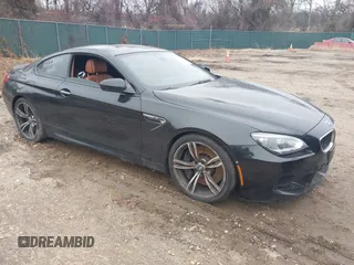 2014 BMW M6 z VIN WBSLX9C58ED160558, wystawiony jako IAAI lot #41553209 z przebiegiem 154 789 mil mil oraz . Historia ofert i sprzedaży dostępna na DreamBid. Obrazek 1.