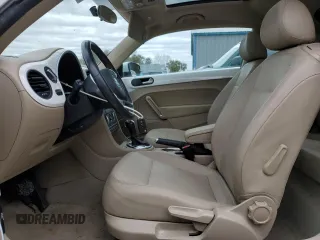 2014 Volkswagen Beetle 2.5L w/Sun with VIN 3VWJP7AT7EM613977, listed as a Copart auction lot 89251315 with 101,885 mi miles and Salvage Title. Bid and sale history available at DreamBid. Image 7.