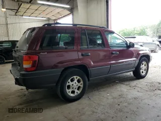 2001 Jeep Grand Cherokee Laredo z VIN 1J4GW48S11C609344, wystawiony jako Copart lot #59258245 z przebiegiem 162 141 mil mil oraz Szkoda całkowita • Salvage title. Historia ofert i sprzedaży dostępna na DreamBid. Obrazek 3.