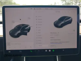 2020 Tesla Model Y Long Range with VIN 5YJYGDEE2LF029385, listed as a IAAI auction lot 42164786 with 58,685 mi miles and . Bid and sale history available at DreamBid. Image 18.
