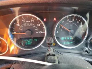 2015 Jeep Wrangler Unlimited Sport with VIN 1C4BJWDG1FL683558, listed as a Copart auction lot 59883545 with 107,267 mi miles and Salvage title. Bid and sale history available at DreamBid. Image 9.