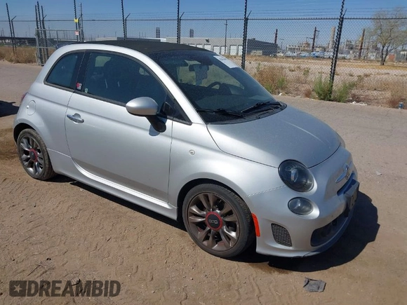 2014 FIAT 500 Abarth with VIN 3C3CFFJH8ET188400, listed as a IAAI auction lot 42014197 with 86,869 mi miles. Bid and sale history available at carsss.com. Image 1.