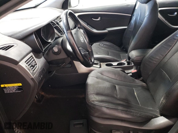 2014 Hyundai Elantra with VIN KMHD35LH3EU215908, listed as a Copart auction lot 75397254 with 127,087 mi miles and Salvage title. Bid and sale history available at DreamBid. Image 7.