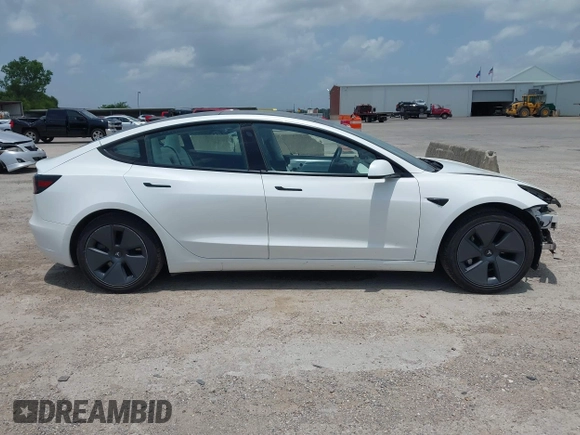 2023 Tesla Model 3 z VIN 5YJ3E1EA8PF384806, wystawiony jako IAAI lot #42526063 z przebiegiem 95 389 mil mil oraz . Historia ofert i sprzedaży dostępna na DreamBid. Obrazek 13.