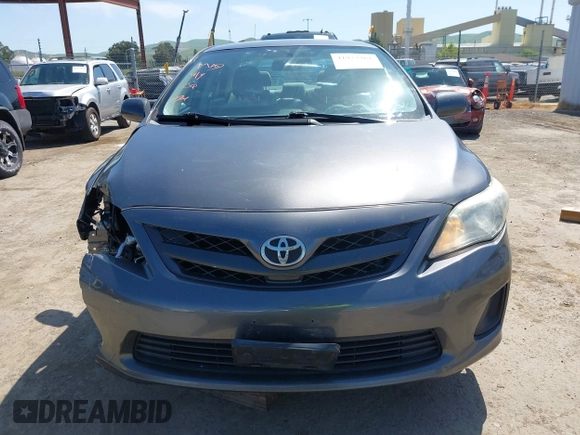 2012 Toyota Corolla L with VIN 5YFBU4EEXCP054988, listed as a IAAI auction lot 41973361 with 193,390 mi miles. Bid and sale history available at carsss.com. Image 12.