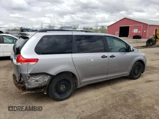 2011 Toyota Sienna z VIN 5TDZK3DC3BS016426, wystawiony jako Copart lot #57070075 z przebiegiem 270 749 mil mil oraz Szkoda całkowita • Salvage title. Historia ofert i sprzedaży dostępna na DreamBid. Obrazek 3.
