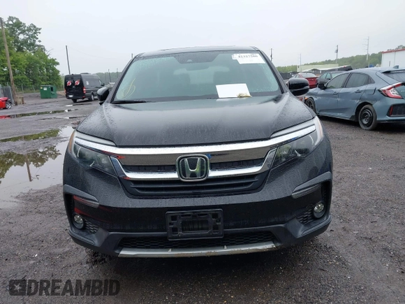 2022 Honda Pilot EX-L with VIN 5FNYF6H58NB018372, listed as a IAAI auction lot 42327580 with 79,332 mi miles and . Bid and sale history available at DreamBid. Image 12.