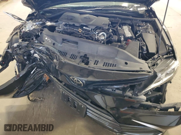 2023 Toyota Camry LE z VIN 4T1R11AK3PU776521, wystawiony jako Copart lot #55927255 z przebiegiem 50 323 mil mil oraz Szkoda całkowita • Salvage title. Historia ofert i sprzedaży dostępna na DreamBid. Obrazek 11.