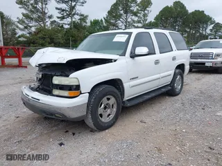 2003 Chevrolet Tahoe LT with VIN 1GNEC13Z93R305114, listed as a IAAI auction lot 41956937 with 176,305 mi miles. Bid and sale history available at carsss.com. Image 2.