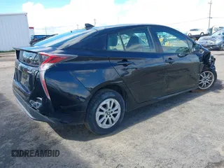 2016 Toyota Prius Two with VIN JTDKBRFU4G3016339, listed as a IAAI auction lot 41797904 with 152,850 mi miles. Bid and sale history available at carsss.com. Image 4.