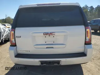 2016 GMC Yukon SLT with VIN 1GKS1BKC4GR138658, listed as a Copart auction lot 76634664 with 132,358 mi miles and Salvage Title. Bid and sale history available at carsss.com. Image 6.