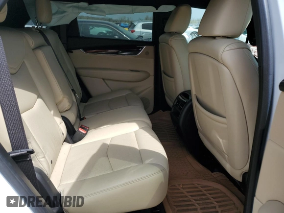 2017 Cadillac XT5 Premium Luxury AWD z VIN 1GYKNERS5HZ319259, wystawiony jako Copart lot #52554725 z przebiegiem Nie podano mil oraz Szkody całkowita. Historia ofert i sprzedaży dostępna na DreamBid. Obrazek 11.