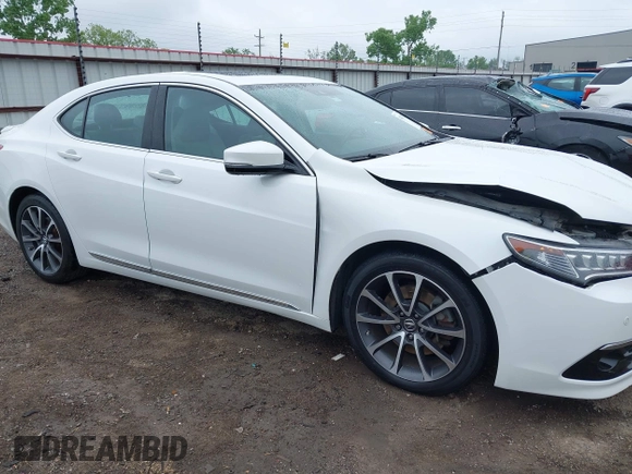2015 Acura TLX Advance with VIN 19UUB2F74FA003547, listed as a IAAI auction lot 42101526 with 129,388 mi miles and . Bid and sale history available at DreamBid. Image 13.