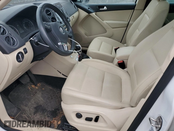 2017 Volkswagen Tiguan Wolfsburg Edition with VIN WVGRV7AX0HK003389, listed as a Copart auction lot 59709615 with 88,491 mi miles and Salvage title. Bid and sale history available at DreamBid. Image 7.