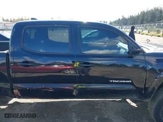 2016 Toyota Tacoma SR5 with VIN 5TFDZ5BN7GX001869, listed as a IAAI auction lot 40610002 with 184,380 mi miles. Bid and sale history available at carsss.com. Image 13.