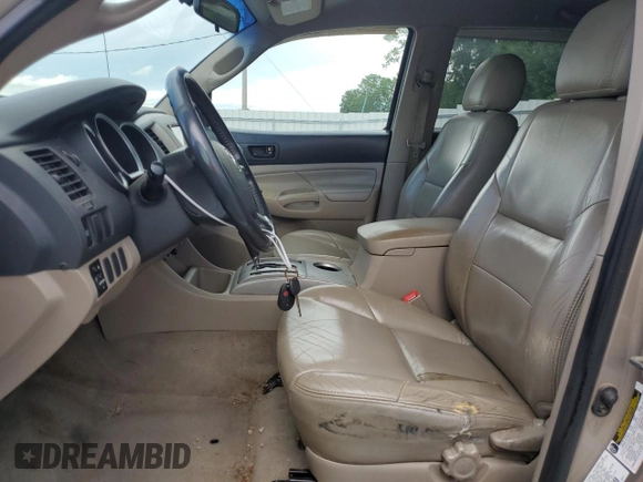 2005 Toyota Tacoma z VIN 5TEMU52N85Z030964, wystawiony jako Copart lot #56659335 z przebiegiem 249 764 mil mil oraz Szkoda całkowita • Salvage title. Historia ofert i sprzedaży dostępna na DreamBid. Obrazek 7.