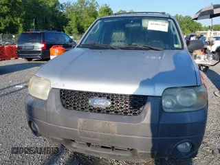 2006 Ford Escape XLT with VIN 1FMYU93156KD26045, listed as a IAAI auction lot 42503718 with 141,738 mi miles and . Bid and sale history available at DreamBid. Image 6.