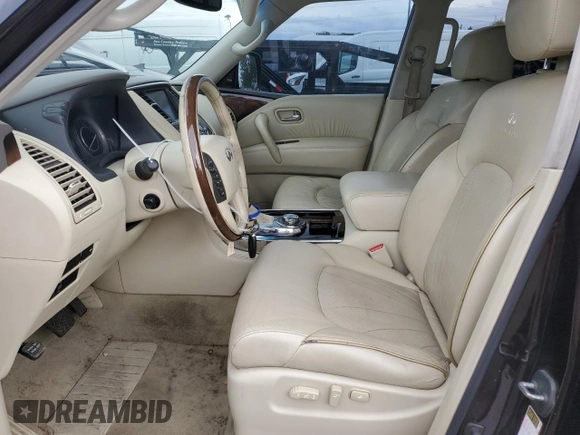 2013 Infiniti QX56 with VIN JN8AZ2NE2D9040676, listed as a Copart auction lot 71395084 with 163,769 mi miles and Salvage Title. Bid and sale history available at carsss.com. Image 7.