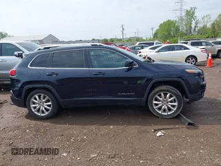 2015 Jeep Cherokee Limited with VIN 1C4PJLDBXFW658441, listed as a IAAI auction lot 42167135 with Not Provided miles and . Bid and sale history available at DreamBid. Image 13.