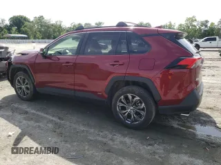2023 Toyota RAV4 Hybrid XLE Premium with VIN JTMB6RFV2PD541262, listed as a Copart auction lot 60106845 with 32,447 mi miles and Salvage title. Bid and sale history available at DreamBid. Image 2.