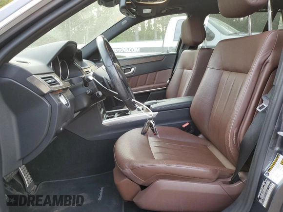 2015 Mercedes-Benz E 350 Luxury with VIN WDDHH8JB0FB134830, listed as a Copart auction lot 70855934 with 106,717 mi miles and Salvage title. Bid and sale history available at DreamBid. Image 7.
