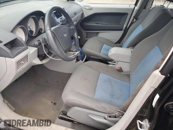 2007 Dodge Caliber R/T z VIN 1B3HB78K27D381608, wystawiony jako Copart lot #81726904 z przebiegiem 147 419 mil mil oraz Szkoda całkowita • Salvage title. Historia ofert i sprzedaży dostępna na DreamBid. Obrazek 7.