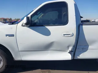 2003 Ford F-150 XL with VIN 1FTRF17293NA46808, listed as a IAAI auction lot 41156923 with 384,475 mi miles and . Bid and sale history available at DreamBid. Image 14.