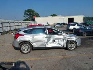 2014 Ford Focus Electric with VIN 1FADP3R43EL353378, listed as a IAAI auction lot 42555423 with 58,114 mi miles and . Bid and sale history available at DreamBid. Image 13.