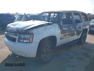 2014 Chevrolet Tahoe LT with VIN 1GNSCBE00ER247632, listed as a IAAI auction lot 41051307 with Not provided miles and . Bid and sale history available at DreamBid. Image 2.