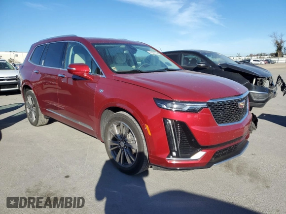 2021 Cadillac XT6 Premium Luxury with VIN 1GYKPDRS8MZ137909, listed as a Copart auction lot 41027774 with 55,353 mi miles and Salvage Title. Bid and sale history available at carsss.com. Image 4.
