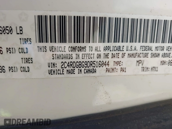 2013 Dodge Grand Caravan SE with VIN 2C4RDGBG9DR516044, listed as a IAAI auction lot 41998893 with 214,645 mi miles and . Bid and sale history available at DreamBid. Image 9.