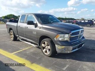 2015 Ram 1500 SLT z VIN 1C6RR6GG3FS549862, wystawiony jako IAAI lot #41536188 z przebiegiem 173 959 mil mil oraz . Historia ofert i sprzedaży dostępna na DreamBid. Obrazek 1.