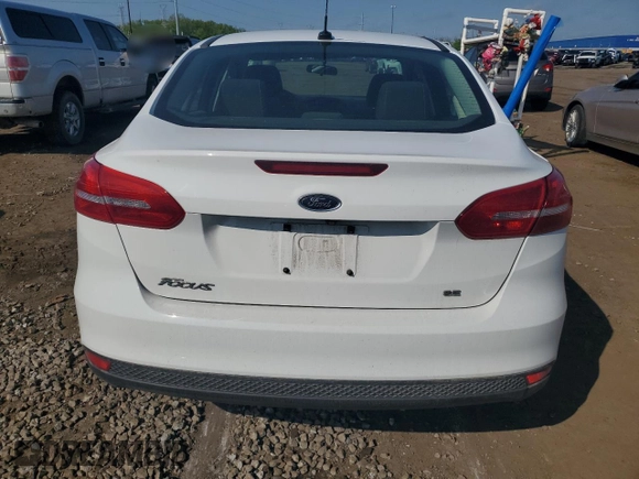 2017 Ford Focus SE with VIN 1FADP3F26HL313478, listed as a Copart auction lot 57078015 with 56,807 mi miles and Salvage title. Bid and sale history available at DreamBid. Image 6.