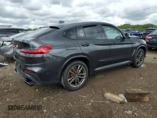 2021 BMW X4 M40i z VIN 5UX2V5C0XM9F04867, wystawiony jako Copart lot #57890555 z przebiegiem 40 563 mil mil oraz Szkoda całkowita • Salvage title. Historia ofert i sprzedaży dostępna na DreamBid. Obrazek 3.
