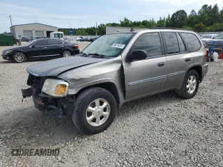 2006 GMC Envoy SLE z VIN 1GKDS13S562182312, wystawiony jako Copart lot #58079035 z przebiegiem 152 167 mil mil oraz Szkoda całkowita • Salvage title. Historia ofert i sprzedaży dostępna na DreamBid. Obrazek 1.