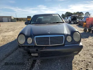 1998 Mercedes-Benz E 320 with VIN WDBJF25F3WA578364, listed as a Copart auction lot 77551834 with 228,913 mi miles and Salvage Title. Bid and sale history available at DreamBid. Image 5.