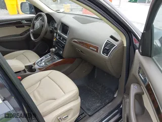 2015 Audi Q5 Premium Plus with VIN WA1LFAFP8FA099671, listed as a IAAI auction lot 42041178 with 169,242 mi miles. Bid and sale history available at carsss.com. Image 5.