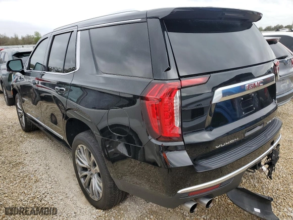 2022 GMC Yukon Denali with VIN 1GKS1DKLXNR104622, listed as a Copart auction lot 79277484 with 32,064 mi miles and Salvage Title. Bid and sale history available at carsss.com. Image 2.