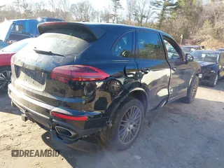 2017 Porsche Cayenne with VIN WP1AA2A27HKA87374, listed as a IAAI auction lot 41230562 with 1 mi miles. Bid and sale history available at carsss.com. Image 4.