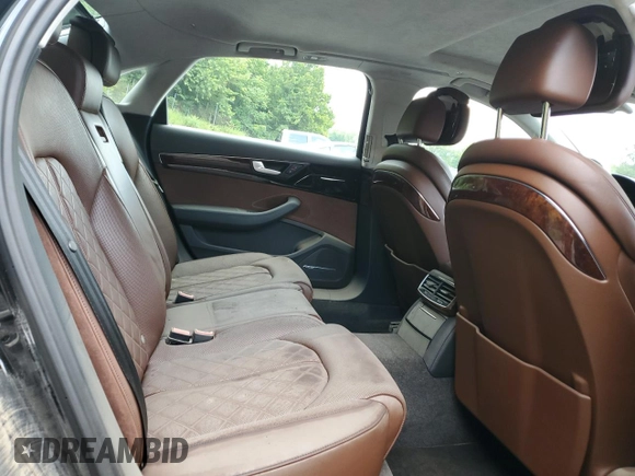 2014 Audi A8 4.0T with VIN WAUR2AFD5EN003923, listed as a Copart auction lot 65389025 with 97,833 mi miles and Salvage title. Bid and sale history available at DreamBid. Image 10.